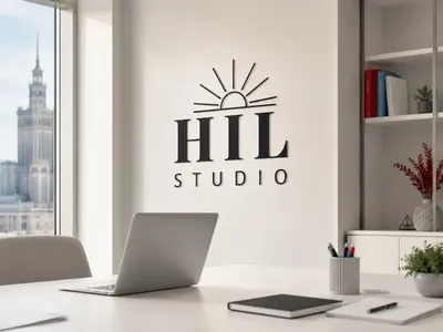 Офіс HIL STUDIO у Варшаві з логотипом на стіні